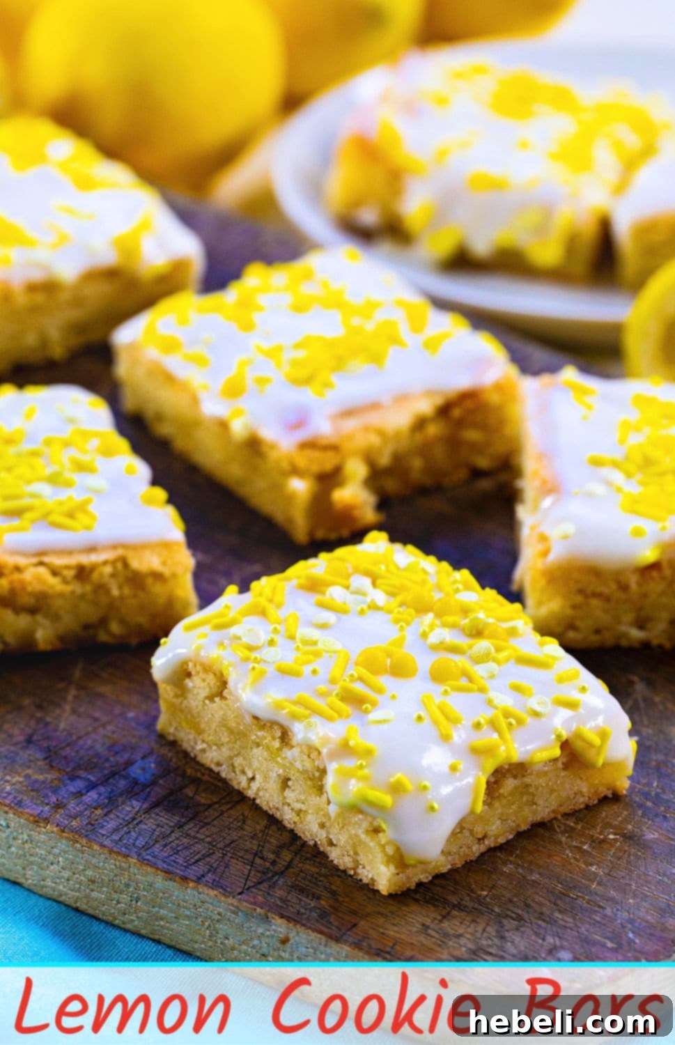 Close-up of a Lemon Cookie Bar with sprinkles on a wooden surface.