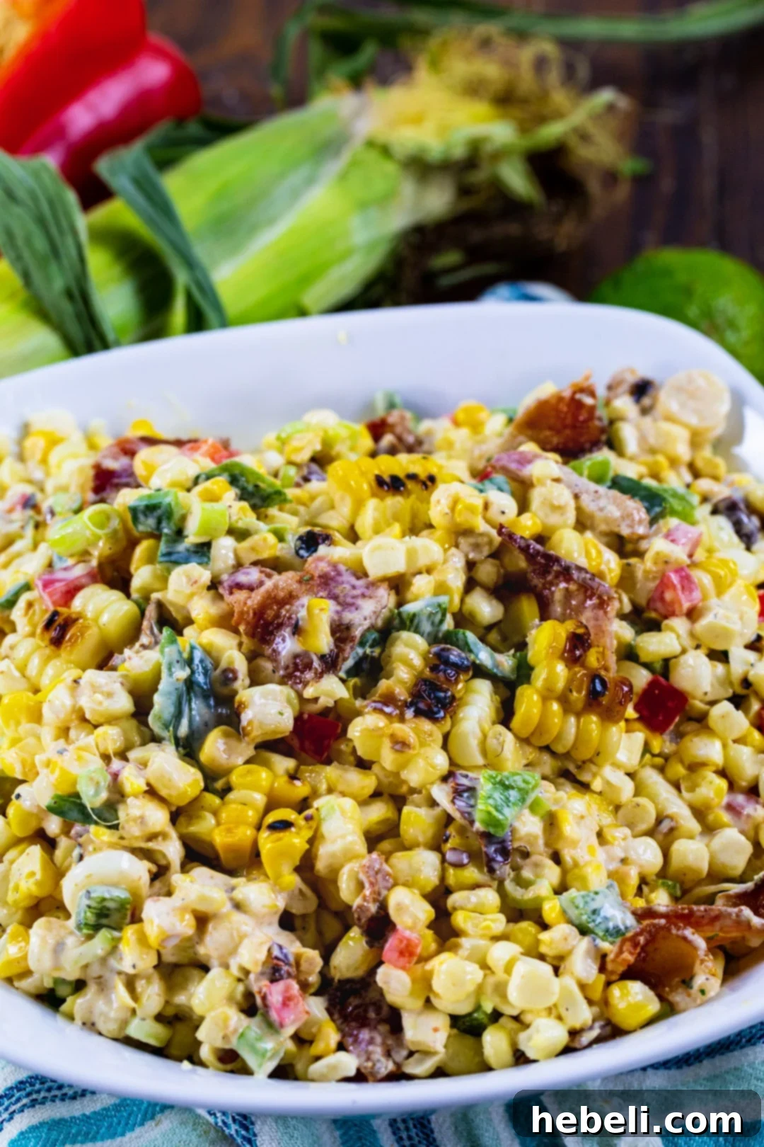 Zesty Chipotle Corn Medley 4 Chipotle Corn Salad in white serving bowl.