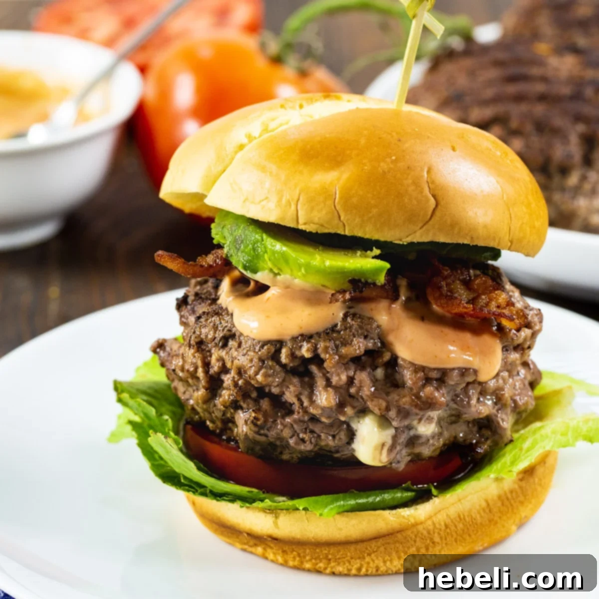 Black and Blue Burgers on toasted brioche buns with bacon and avocado.