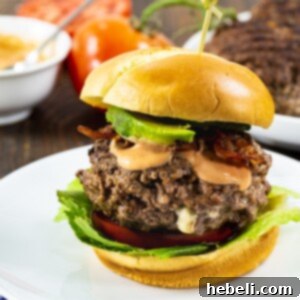 Black and Blue Burgers on toasted brioche buns with bacon and avocado.