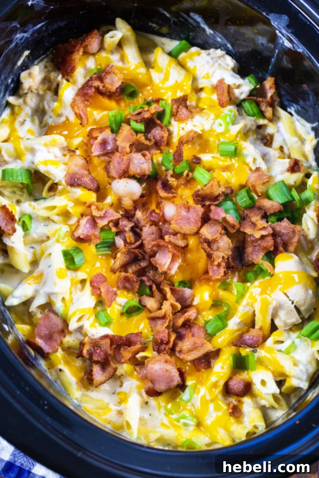Addictive Slow Cooker Chicken Pasta 3 Creamy Crack Chicken Pasta simmering beautifully inside a large slow cooker, ready to be served.
