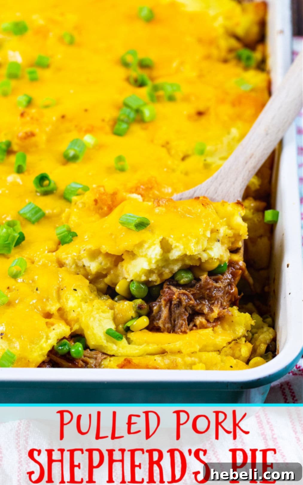 Hearty Pulled Pork Shepherds Pie 5 A full 9x13-inch baking dish filled with Pulled Pork Shepherd's Pie, showcasing the golden-brown mashed potato topping and inviting textures, ready for serving.