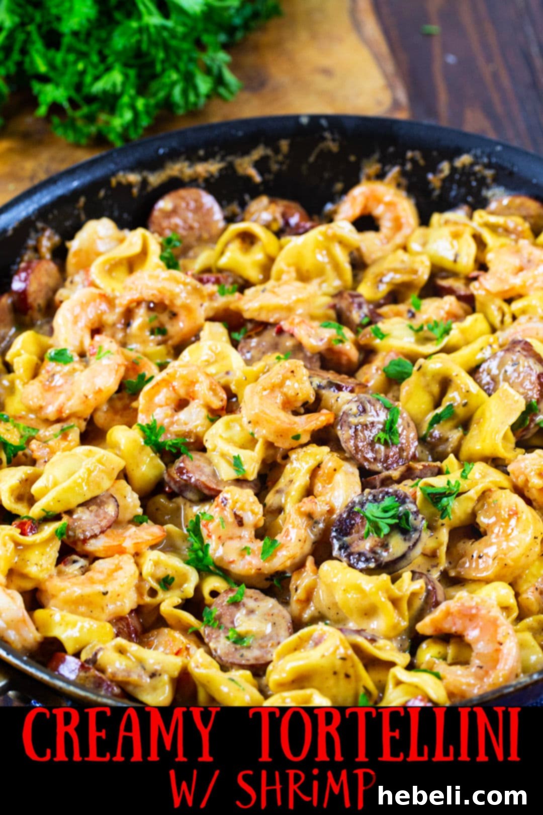 Velvety Shrimp Tortellini 5 Cooked tortellini in a large skillet, ready to be tossed with sauce and other ingredients.