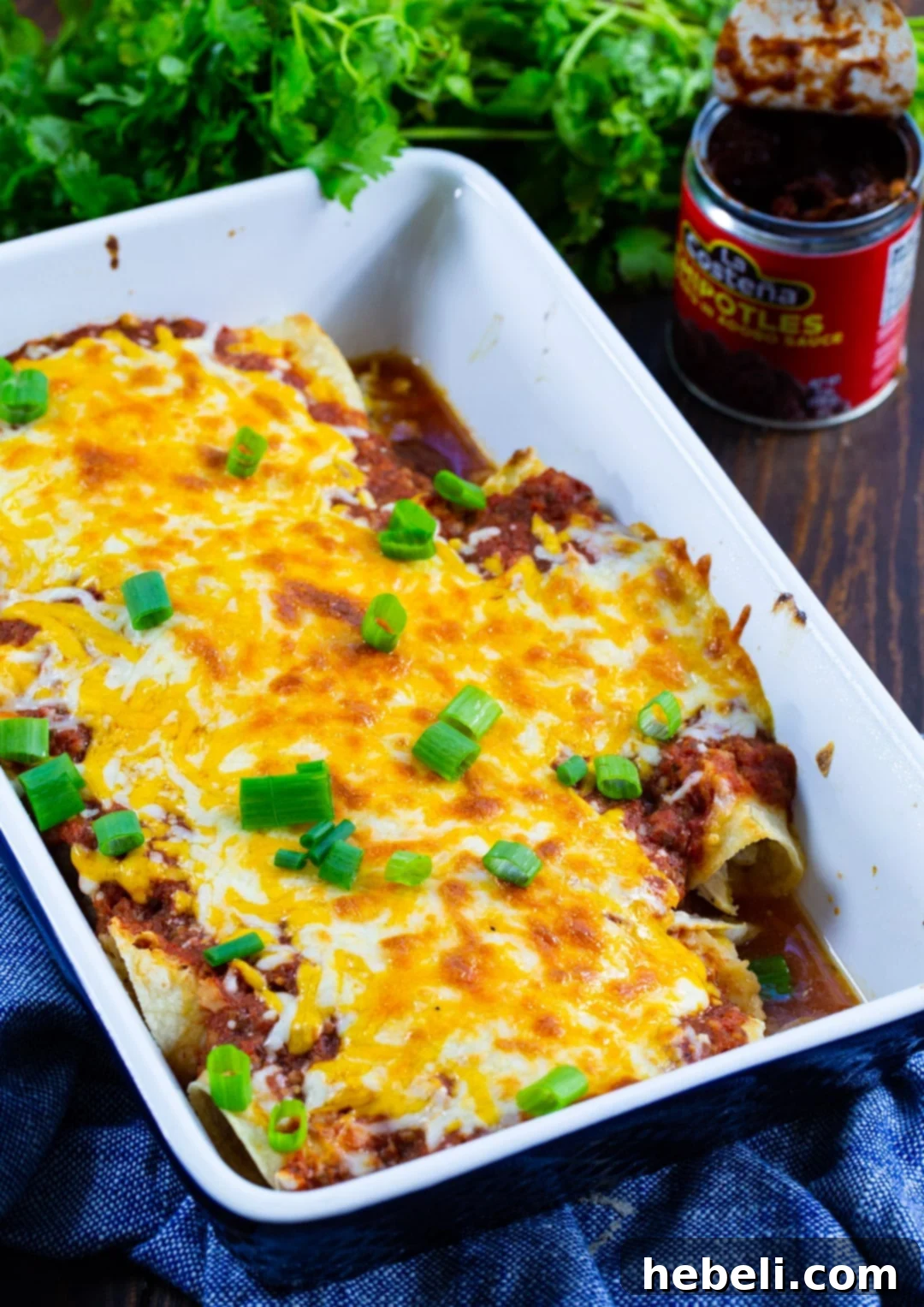 Enchiladas in a baking dish.