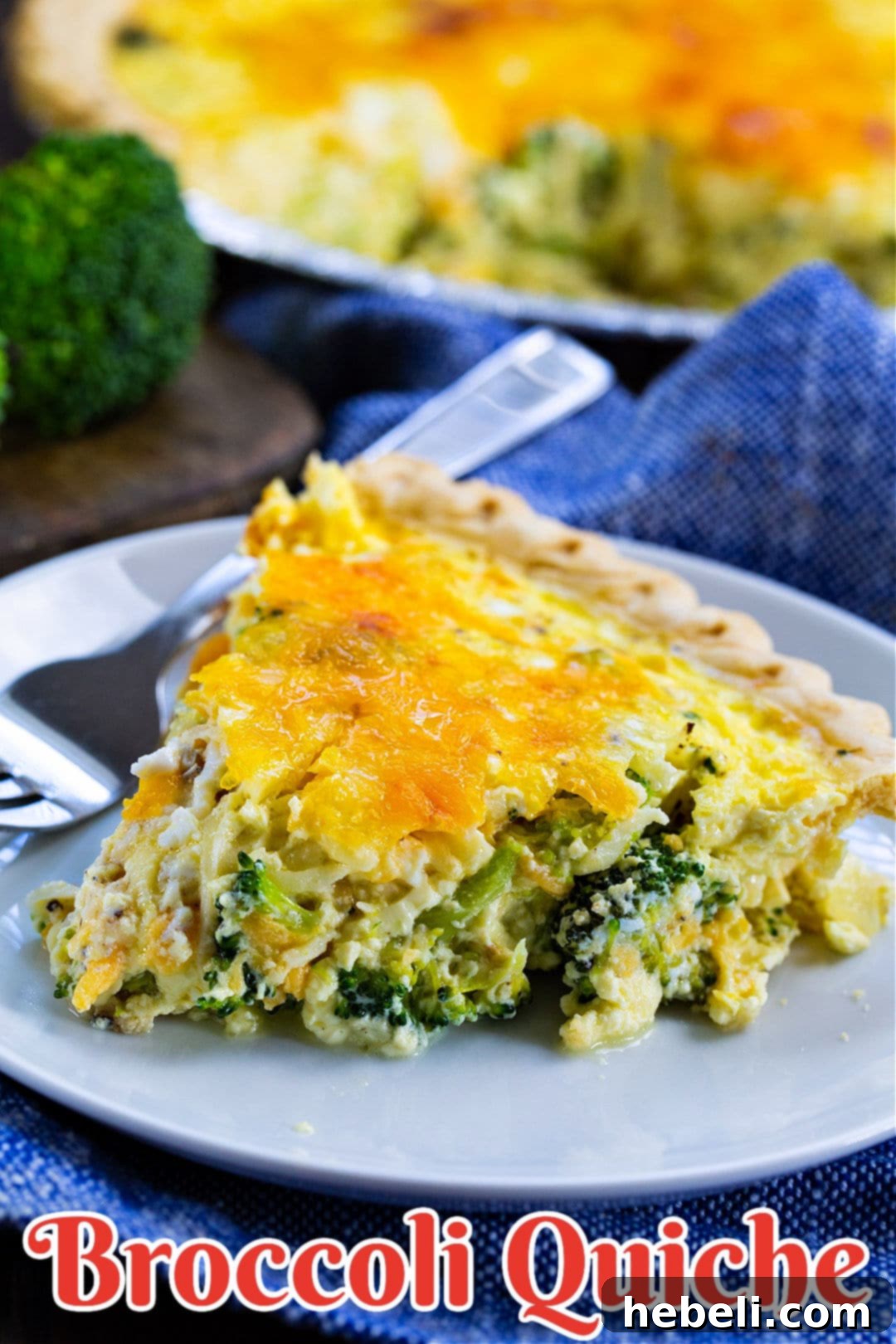 A close-up shot of a golden-brown Broccoli Quiche, showcasing its rustic charm and inviting texture, ready to be sliced and served at a cozy gathering.