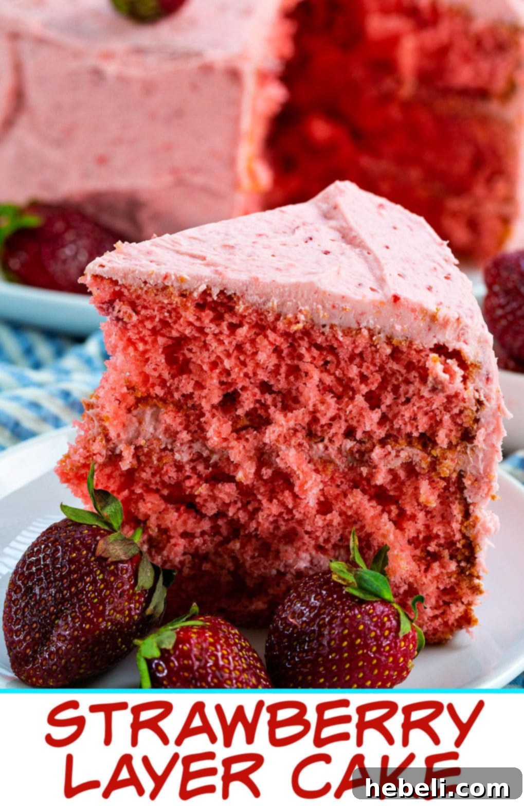 A perfectly portioned slice of Strawberry Layer Cake on a plate, ready to be enjoyed.