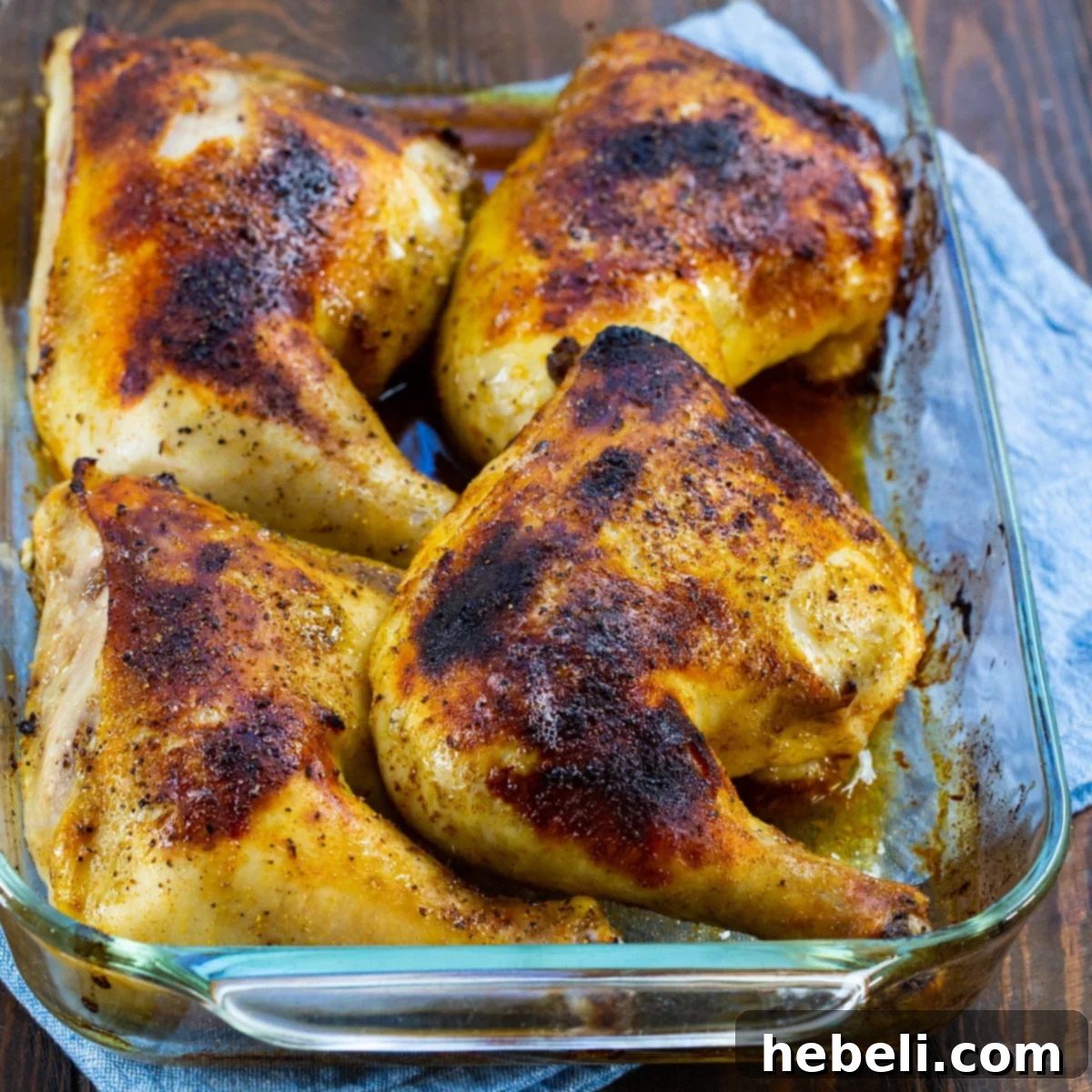 Zesty Margarita Chicken Bake 2 Baked Margarita Chicken in a baking pan, fresh from the oven, with golden-brown, crispy skin.