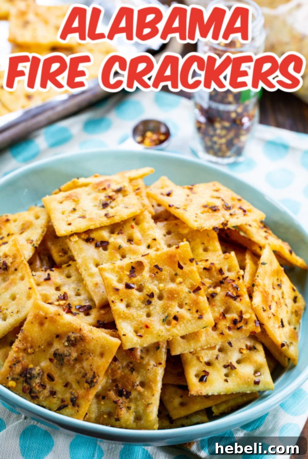 A close-up of Alabama Fire Crackers in a blue bowl, highlighting their savory texture and seasoning.