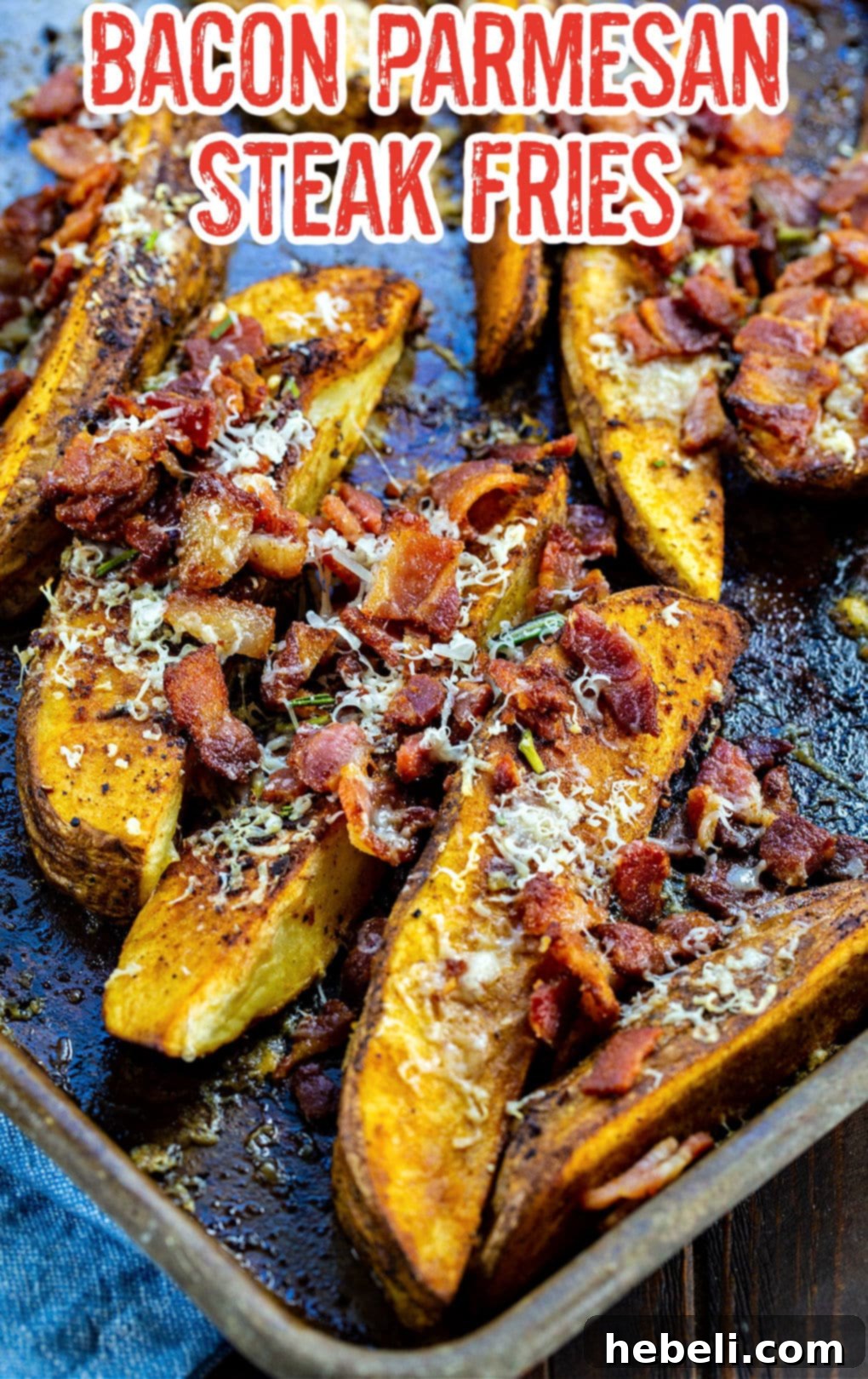 Loaded Bacon Parmesan Steak Fries 3 Steak Fries coated in seasoning on baking sheet.