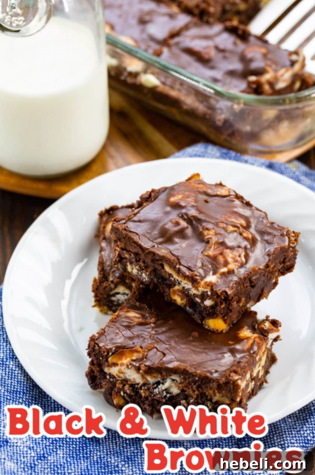 Tuxedo Brownies 4 Black and White Brownies on a plate, ready to be served, highlighting their rich texture and appealing contrast.