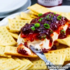 Finished Cranberry Pepper Jelly Dip in a small bowl.