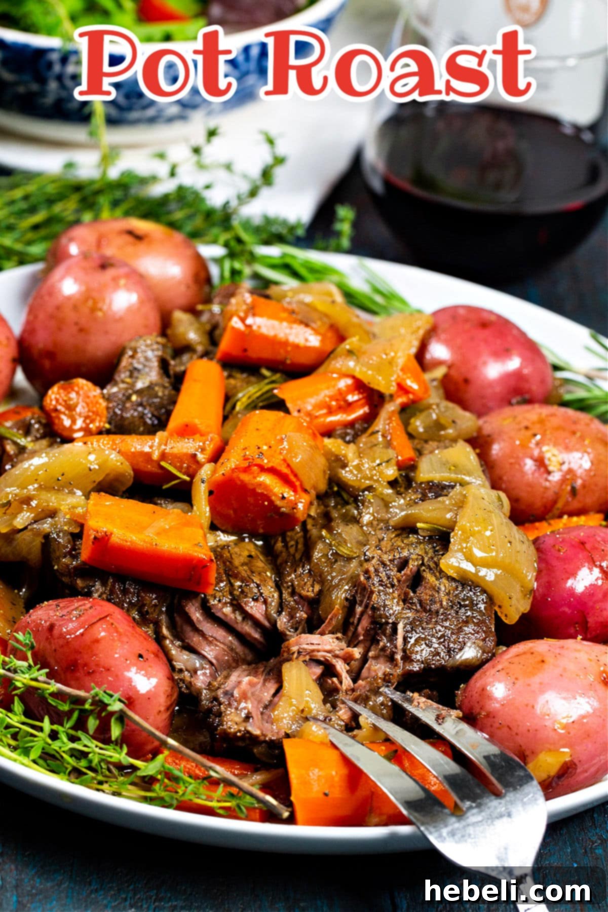 Perfectly Tender Pot Roast 6 Fork cutting into pot roast.