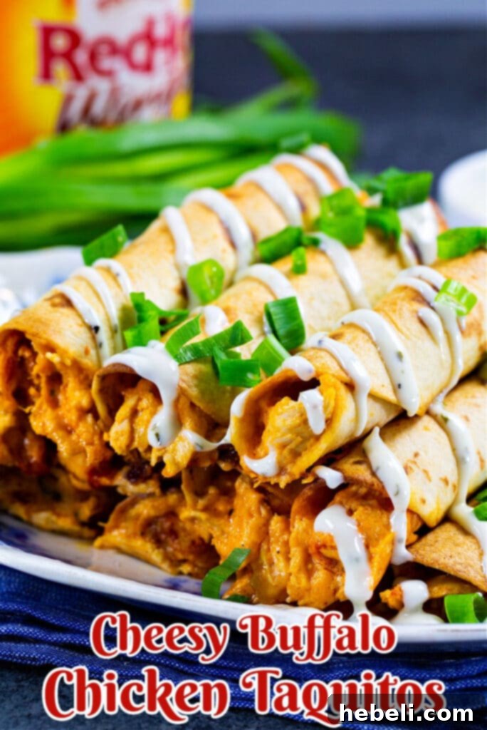 Golden Crispy Buffalo Chicken Taquitos A beautifully arranged platter of Cheesy Buffalo Chicken Taquitos, highlighting their golden-brown and crispy finish.