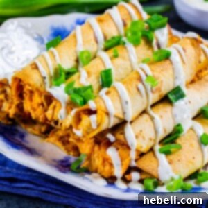 Cheesy Buffalo Chicken Taquitos Recipe A dish of freshly prepared Cheesy Buffalo Chicken Taquitos, showcasing their delicious filling and crispy shell.