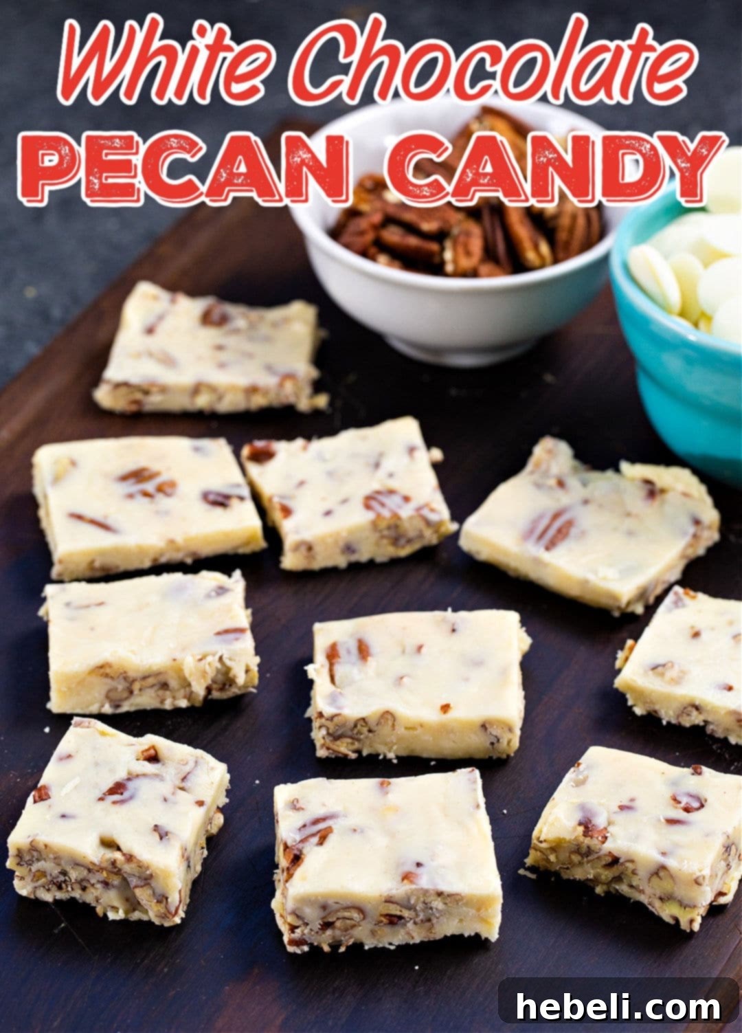 Close-up of neatly cut White Chocolate Pecan Candy squares on a wooden cutting board, ready to be served.