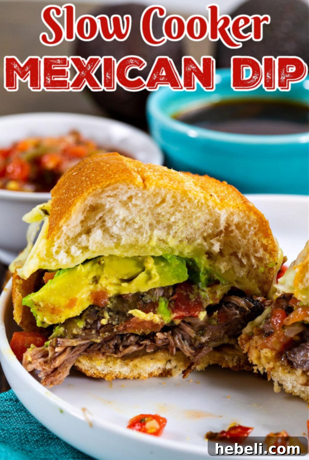 Slow Cooker Mexican Dip Sandwich cut in half.
