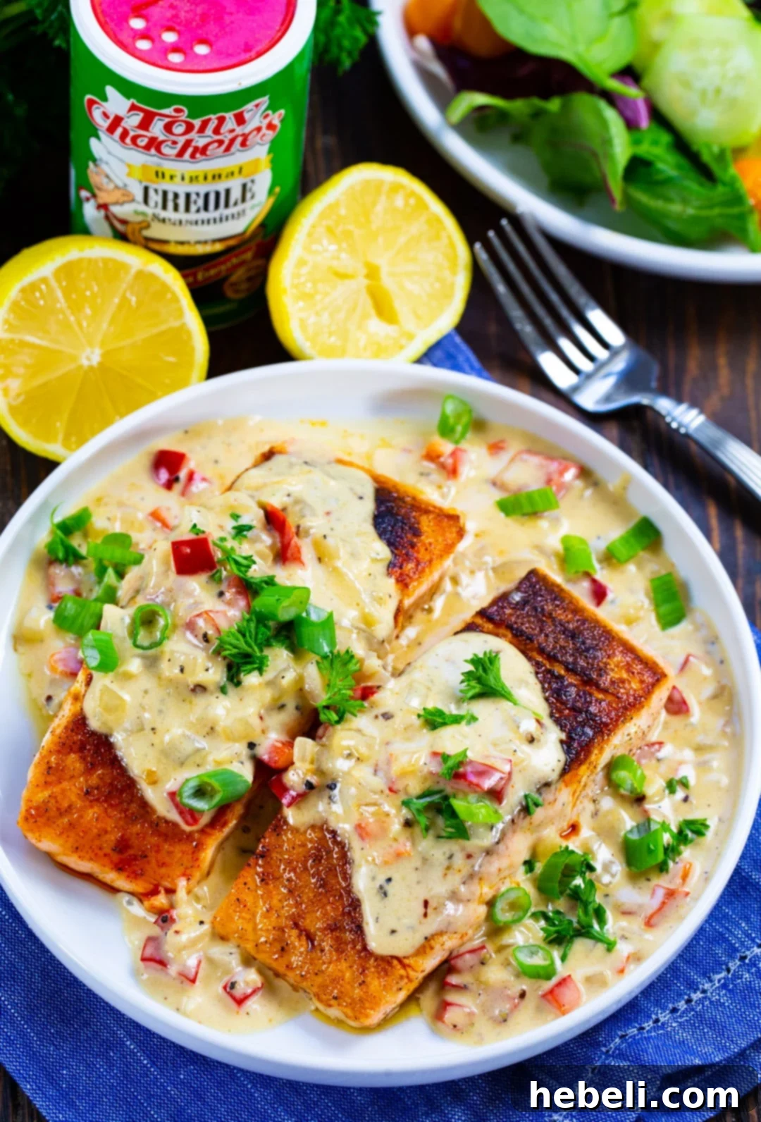 Creamy Parmesan Cajun Salmon 3 Close-up of salmon covered in the creamy Parmesan sauce.
