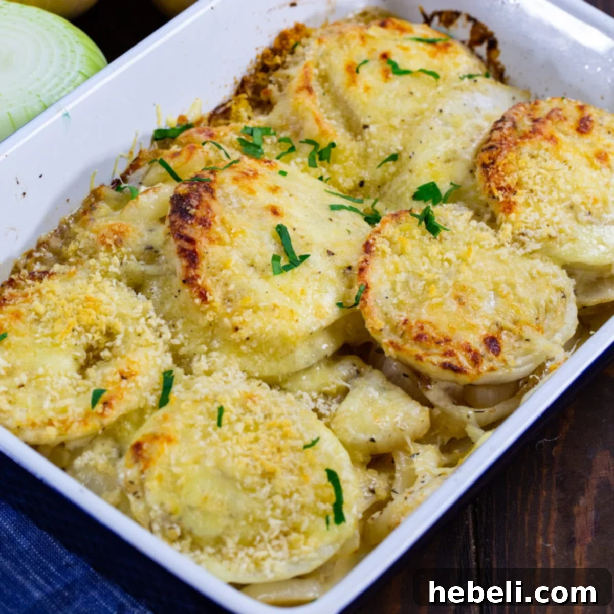 Sweet & Creamy Vidalia Gratin 2 Baked Vidalias Au Gratin in a baking dish, golden brown and bubbling.
