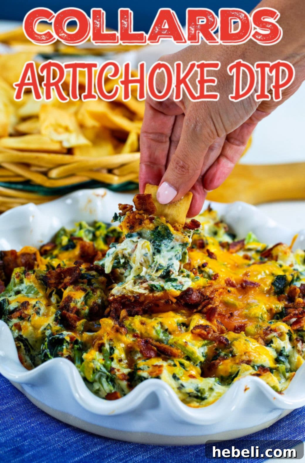 Another close-up of a pita chip generously laden with creamy Collards Artichoke Dip, garnished with crumbled bacon and fresh parsley, ready to be enjoyed.