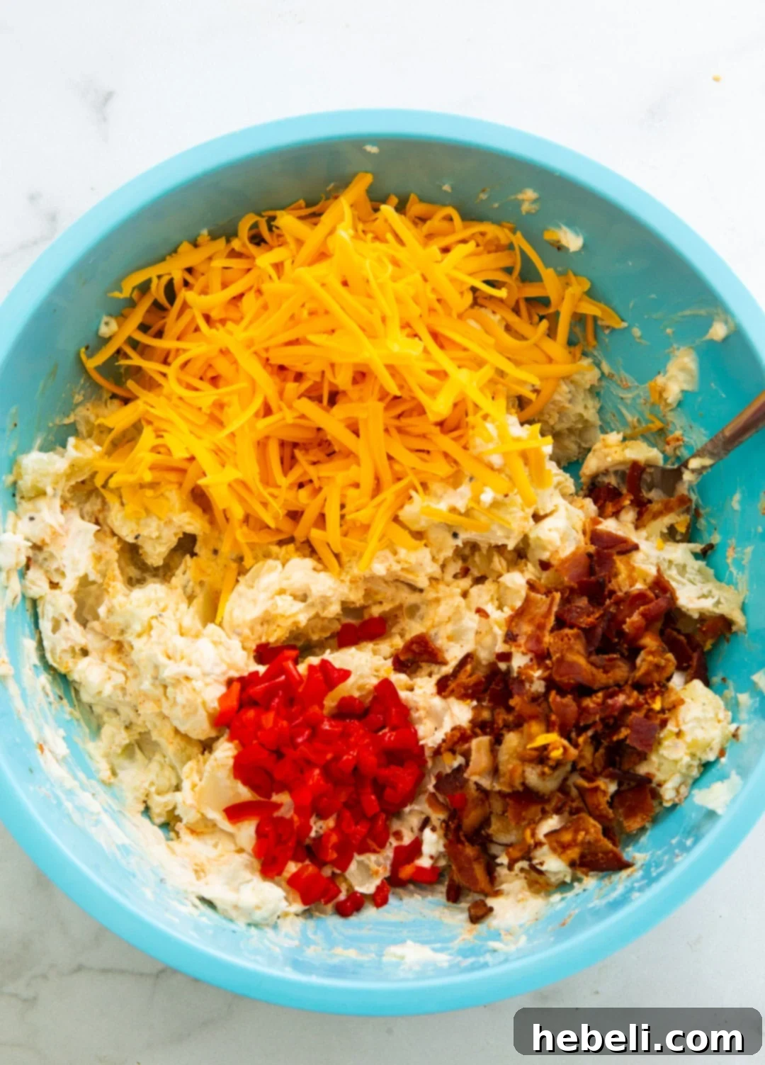 All the delicious ingredients combined in a mixing bowl.