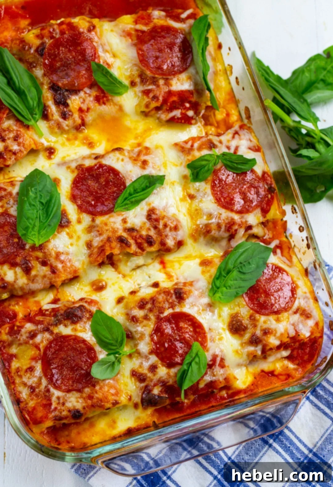 Lasagna Roll-Ups in baking dish.