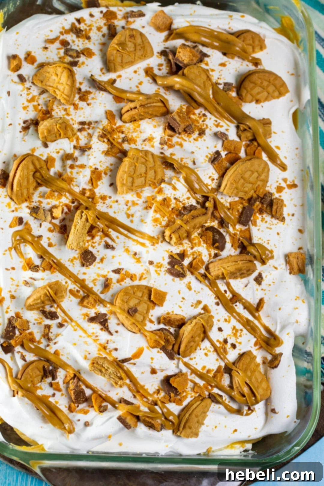 Peanut butter layer dessert in 9x13-inch pan, showing multiple layers before final topping.
