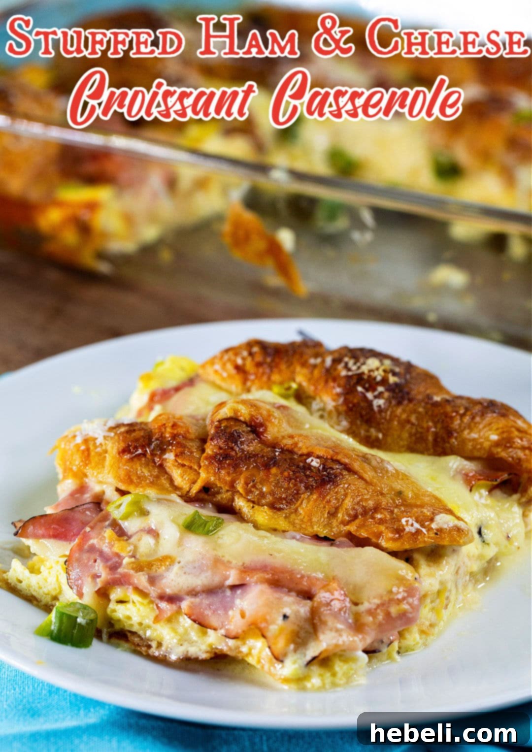 Savory Ham and Cheese Croissant Bake 7 Another mouth-watering shot of a single slice of Stuffed Ham and Cheese Croissant Casserole, showcasing its flaky texture and rich filling.
