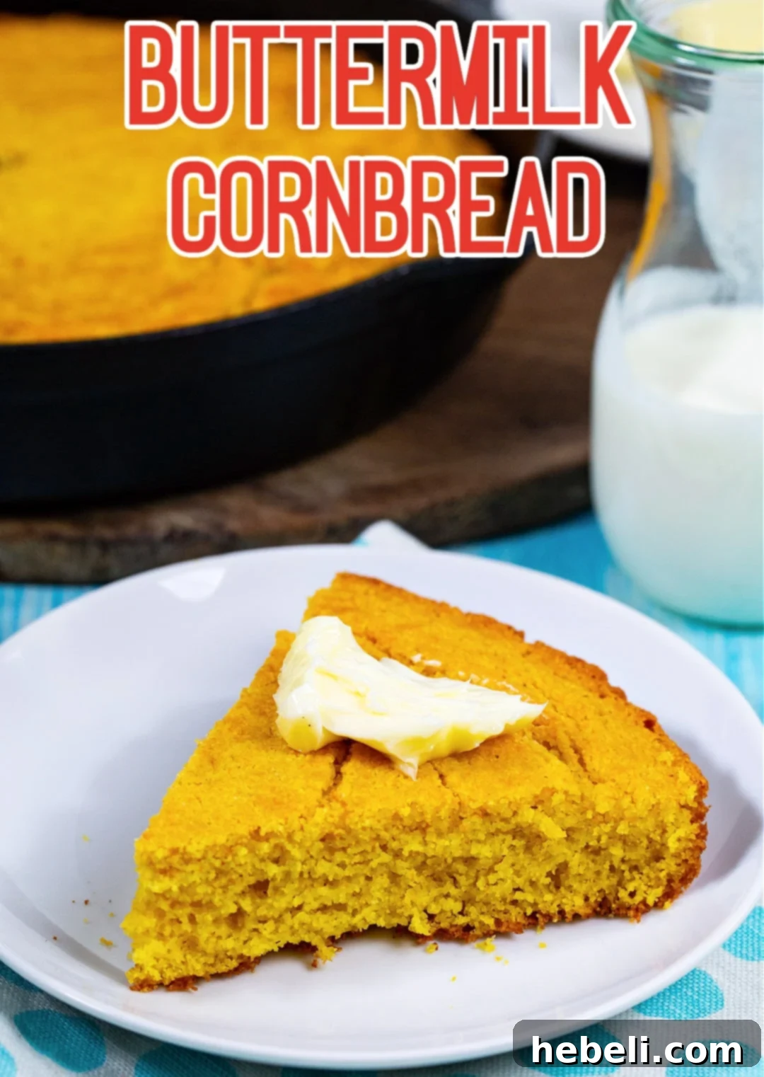 A single slice of Buttermilk Cornbread resting on a white plate, showcasing its golden color.