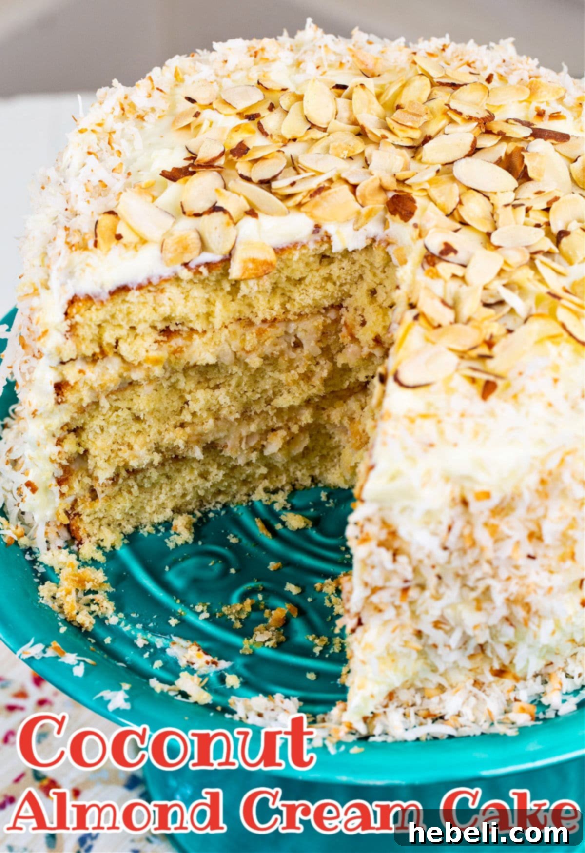 A close-up view of the Coconut Almond Cream Cake, showing its delightful layers and texture.