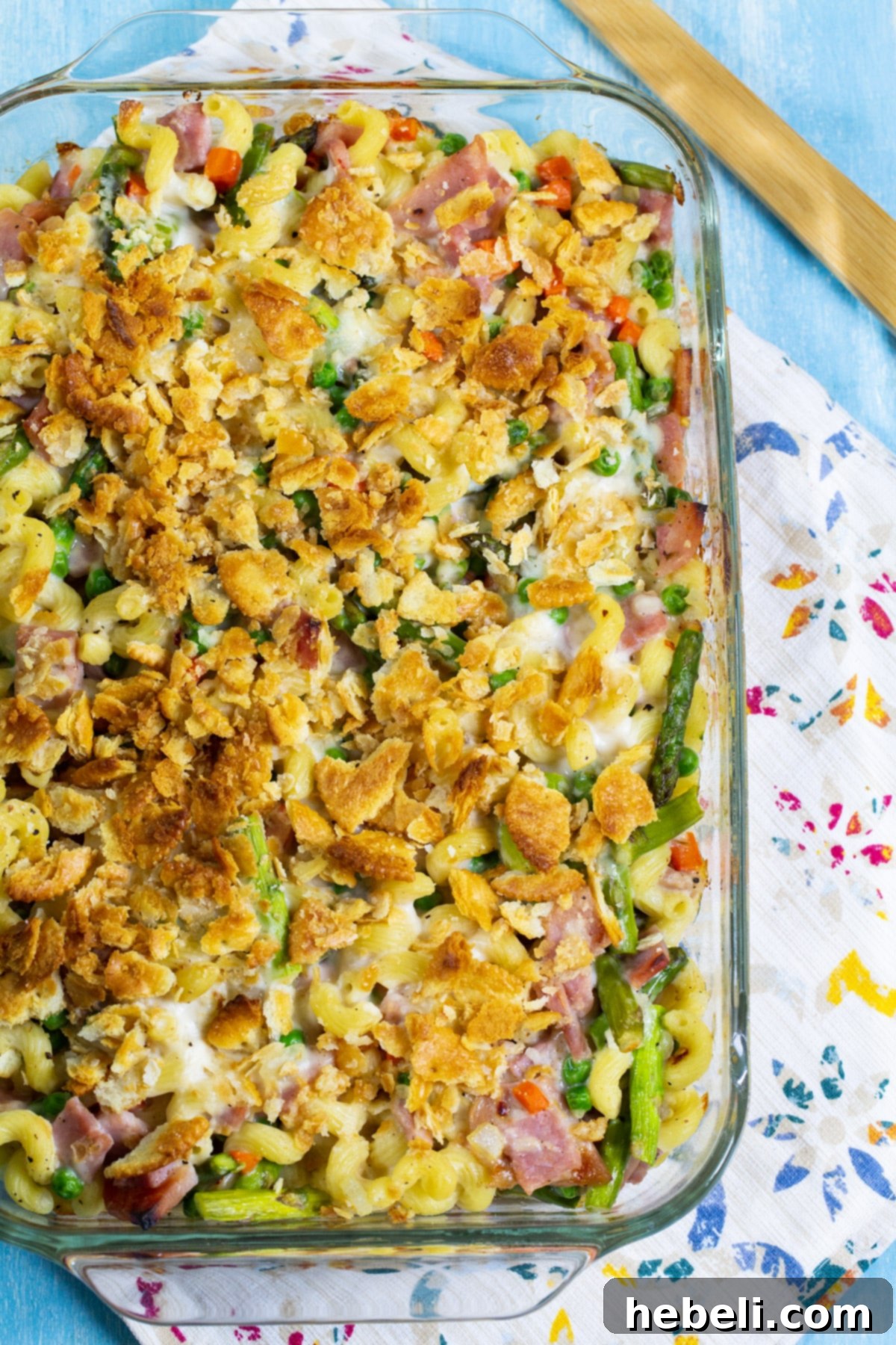Savory Ham and Asparagus Bake 3 A golden-brown baked casserole, bubbling gently in a 9x13-inch baking dish, ready to be served.
