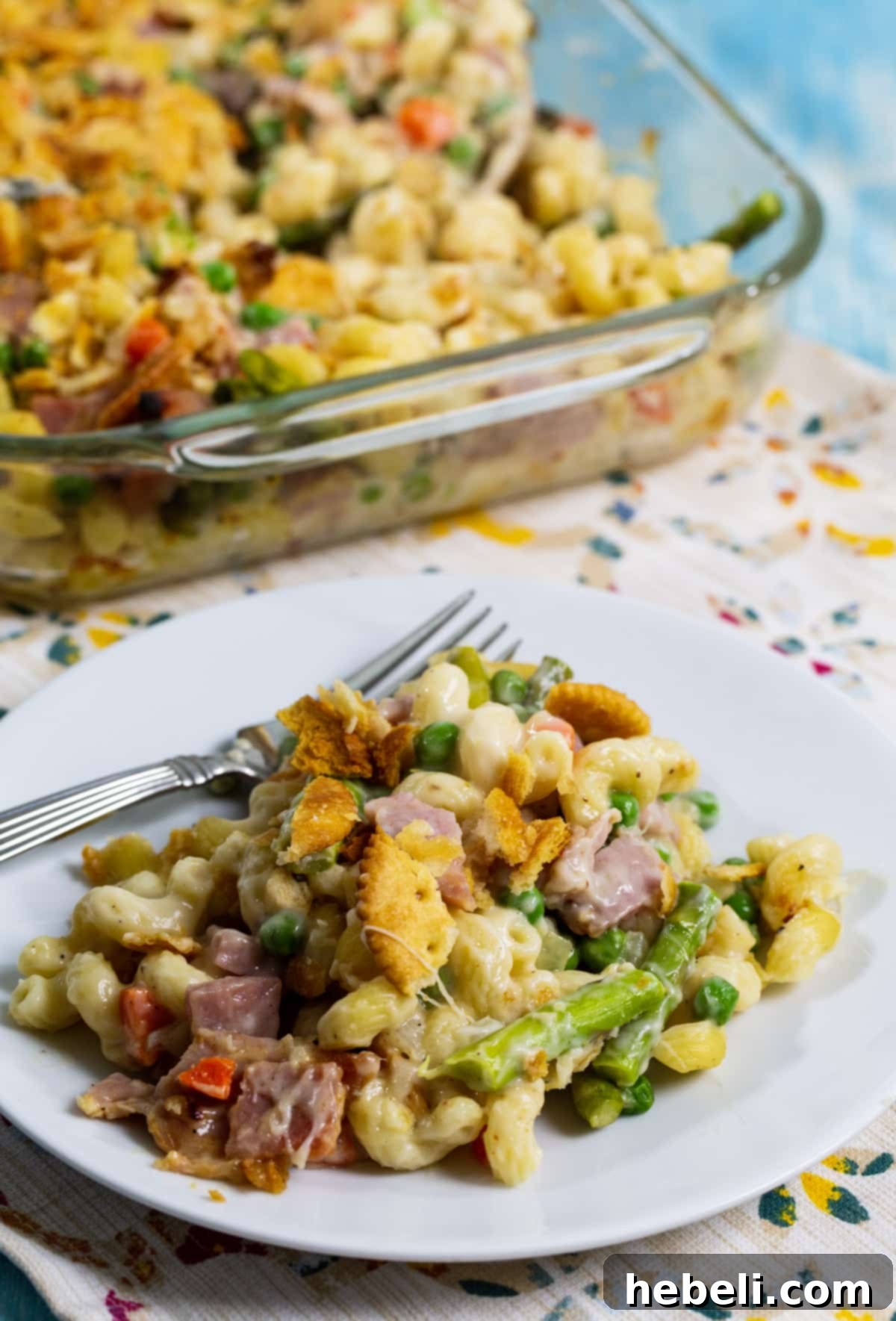Savory Ham and Asparagus Bake 6 A beautifully presented plate of Ham and Asparagus Casserole, ready to be enjoyed, highlighting its comforting appeal.