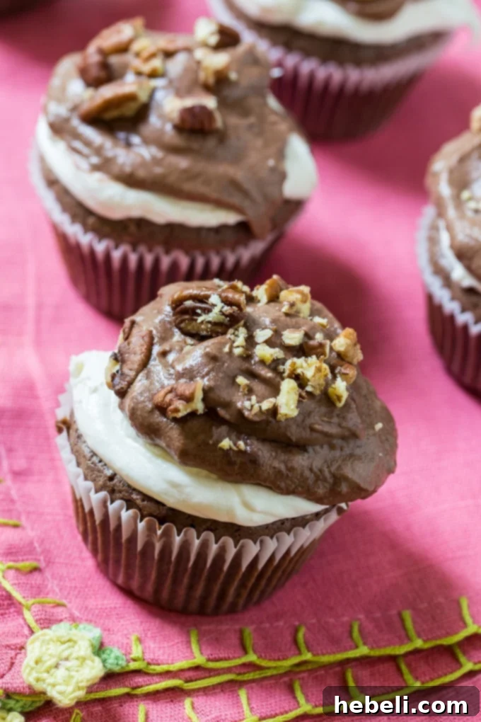 Close-up of a Mississippi Mud Cupcake showing marshmallow and chocolate layers