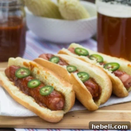 Signature Dr. Pepper BBQ Hot Dogs 2 Three hot dogs topped with jalapeno slices, coated in Dr. Pepper Barbecue Sauce.