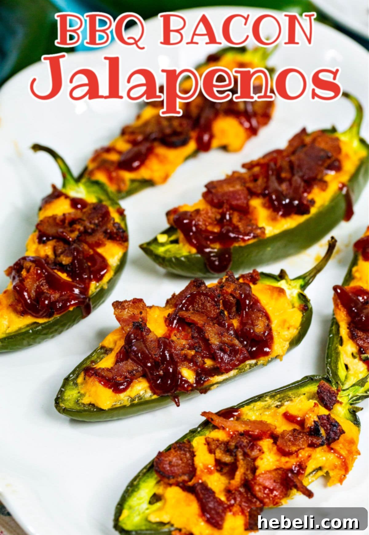 A large platter overflowing with perfectly baked BBQ Bacon Jalapenos, ready for a gathering.