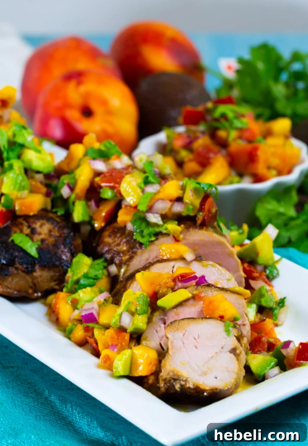 Seared Pork Tenderloin with Bright Nectarine Avocado Salsa 4 Perfectly sliced pork tenderloin medallions, each piece generously topped with fresh nectarine avocado salsa.