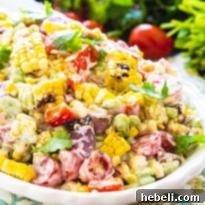 Grilled Corn Salad with Butter Beans on a white serving platter