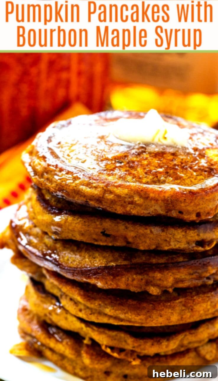 Maple Kissed Bourbon Vanilla Pumpkin Pancakes 4 A close-up shot of pumpkin pancakes being drizzled with bourbon vanilla maple syrup, highlighting the glossy texture of the syrup and the golden hue of the pancakes.