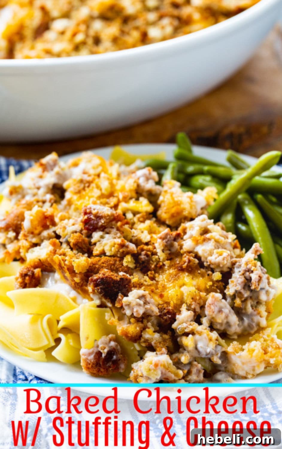 A close-up of a serving of Sandy's Chicken with golden-brown stuffing and melted cheese, garnished with a sprig of fresh parsley, showcasing its inviting texture and warmth.