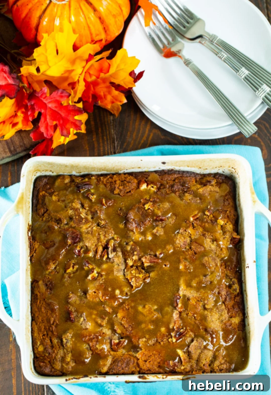 Whole Pumpkin Coffee Cake in a round baking dish, showcasing its streusel topping and golden crust.