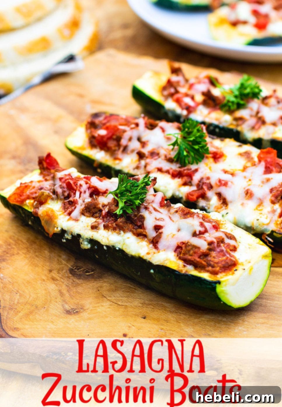 Hearty Zucchini Lasagna Boats 6 A beautifully presented Lasagna Zucchini Boat, garnished with fresh basil, ready to be enjoyed as a low-carb Italian dinner.