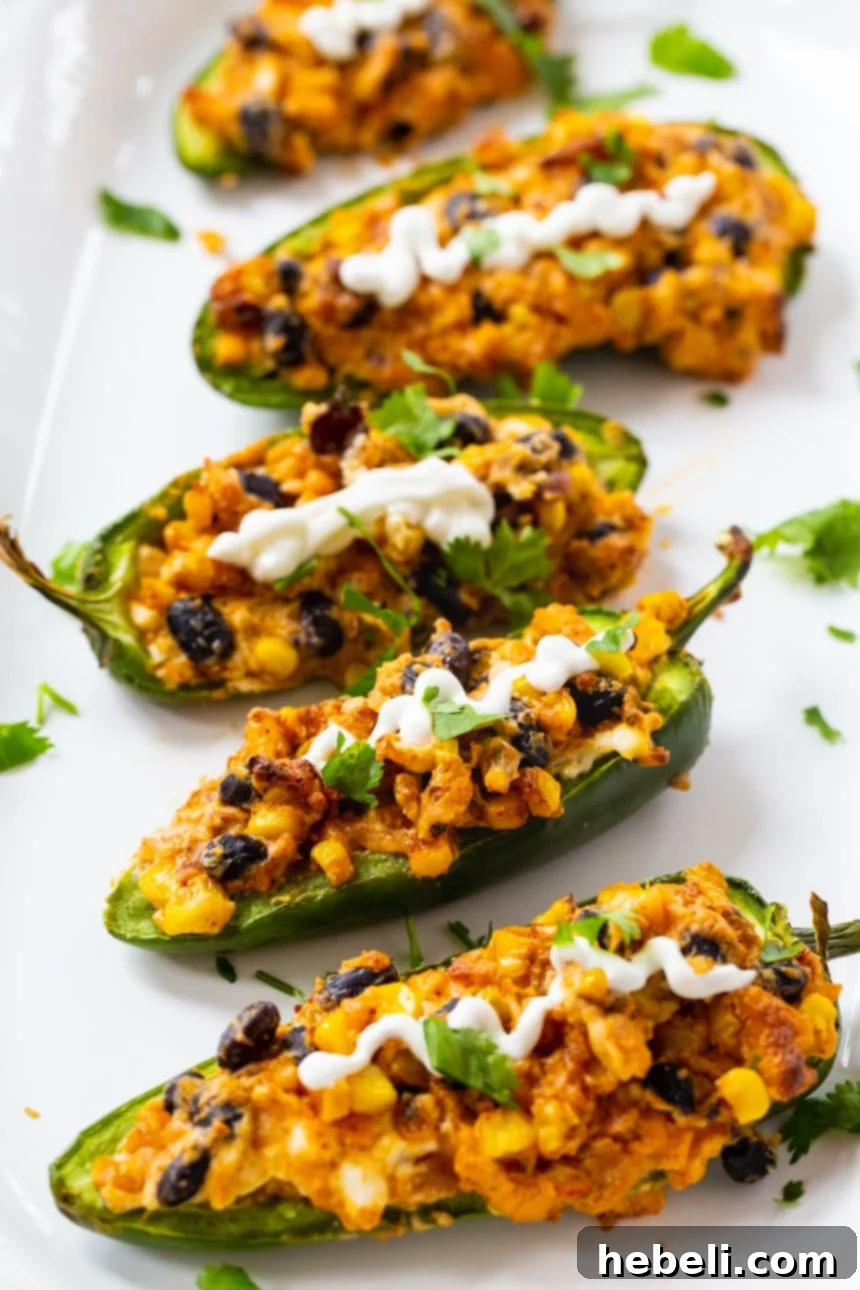 Fiesta Black Bean and Corn Jalapenos 6 Stacked Black Bean and Corn Stuffed Jalapenos, a perfect vegetarian appetizer.
