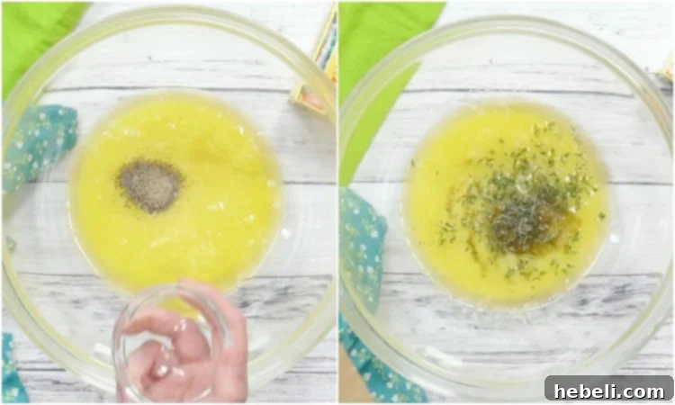 A bowl containing a rich mixture of melted butter, fragrant thyme, salt, and pepper, ready to coat the potato slices.