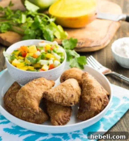 Caribbean Golden Patties 4 Cross-section of West Indies Patties revealing the savory beef and vegetable filling