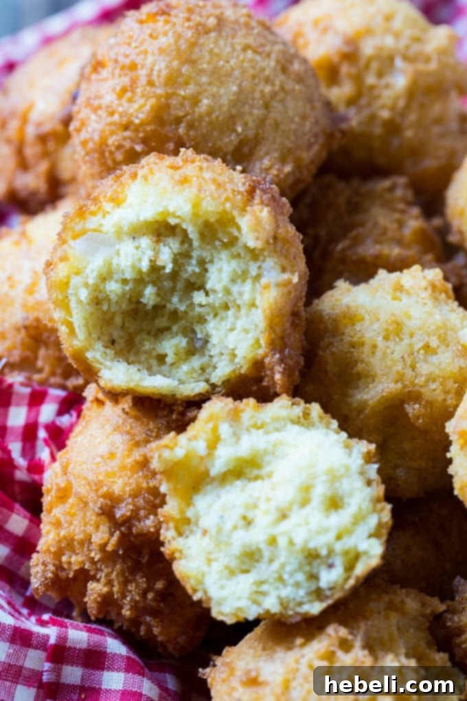 Close-up of golden Hush Puppies, ready to serve