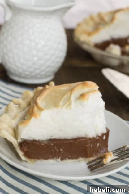 Old-Fashioned Chocolate Meringue Pie, beautifully presented and ready to serve.
