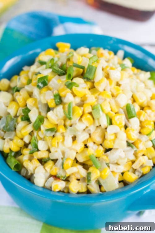 Whiskey Kissed Creamed Corn 6 Serving of Bourbon Creamed Corn with a sprig of green onion