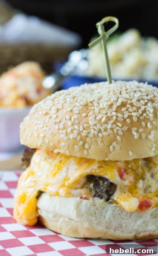 Another mouthwatering view of the Pimiento Cheese Burger, highlighting the golden-brown patty and melted cheese. #recipe