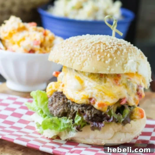 A beautifully composed Pimiento Cheese Burger, demonstrating the perfect ratio of bun, patty, and cheese. #recipe
