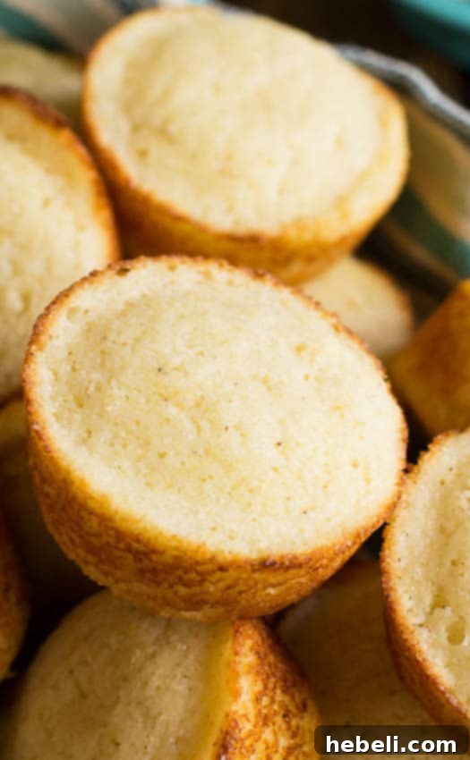 Tangy Golden Cornbread Muffins 4 Buttermilk Cornbread Muffins served warm with melted butter.