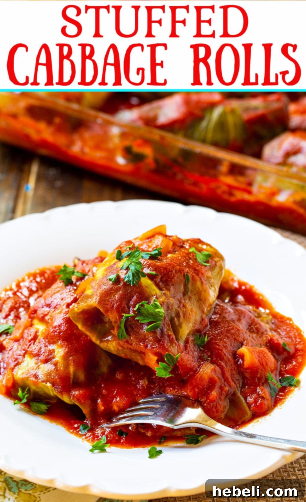 Close-up of a single Stuffed Cabbage Roll, showing the succulent filling and the rich, glossy sauce, ready to be enjoyed.